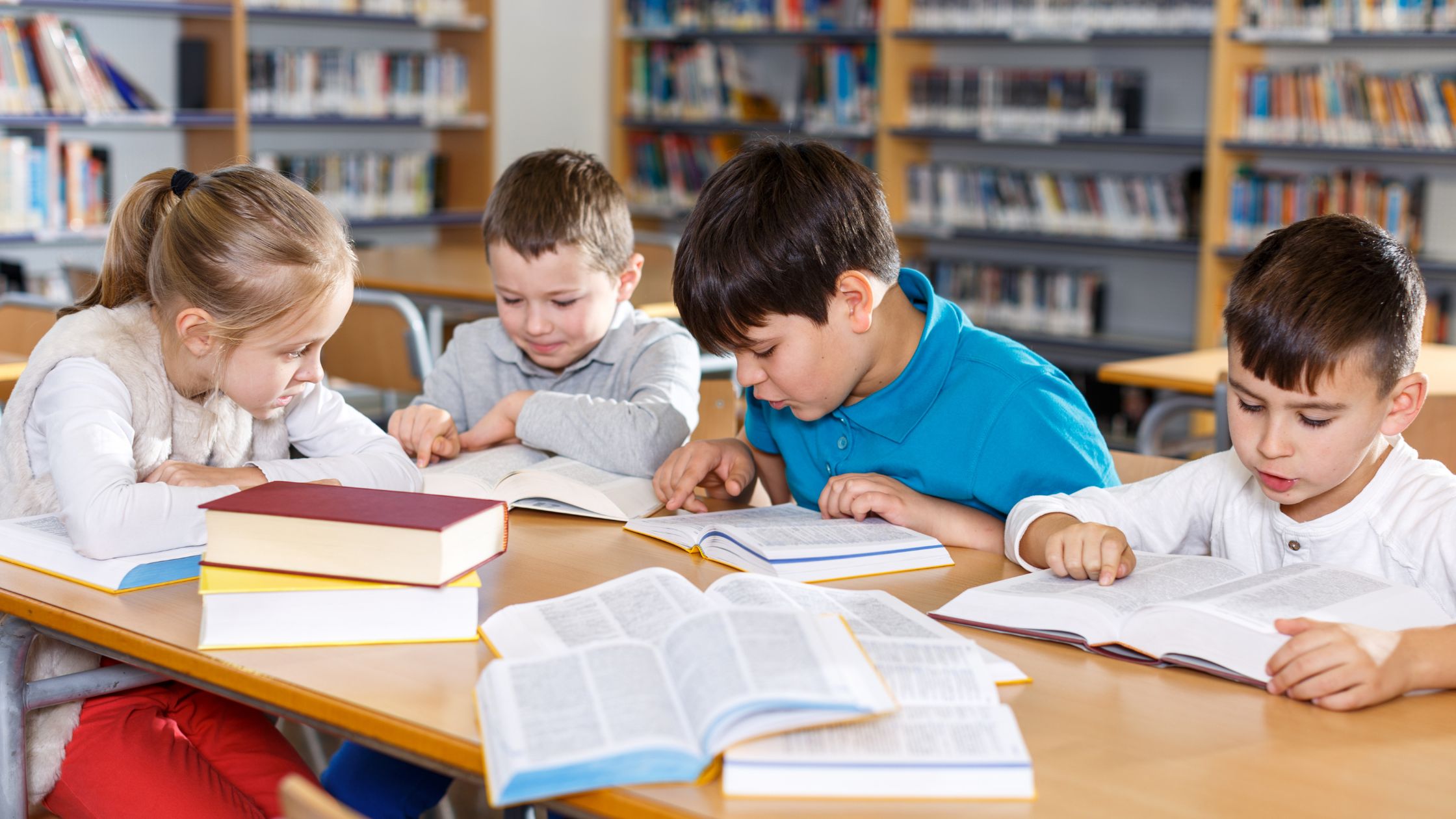 An image of kids in a library for an article about "cultural books for kids."