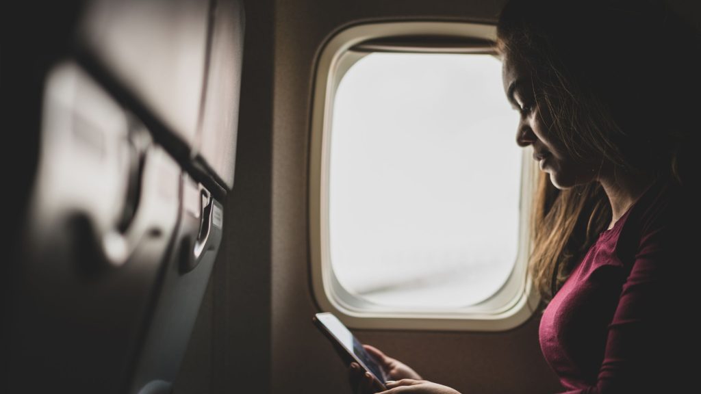 entertainment airpods on a plane