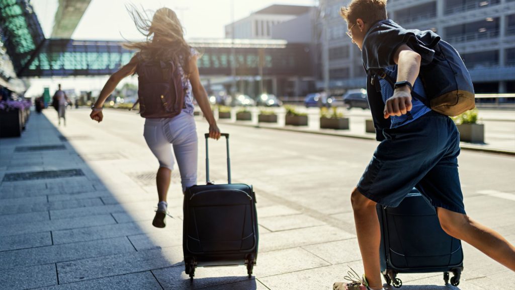 A couple hurrying to catch their flight.