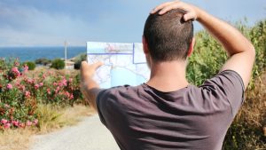 An image of a man without travel goals for an article about "travel hacking mistakes."