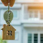 An image of an Airbnb house key for an article about Airbnb pricing strategies.