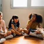 An image of children in a play room for an article about "diversity activities for kids."