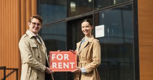 An image of Airbnb hosts advertising their property for an article about how to be the best Airbnb host.