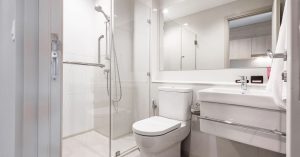 An image of a well-maintained bathroom for an article about How to decorate an Airbnb.