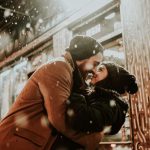 couple madly in love kissing in the snow