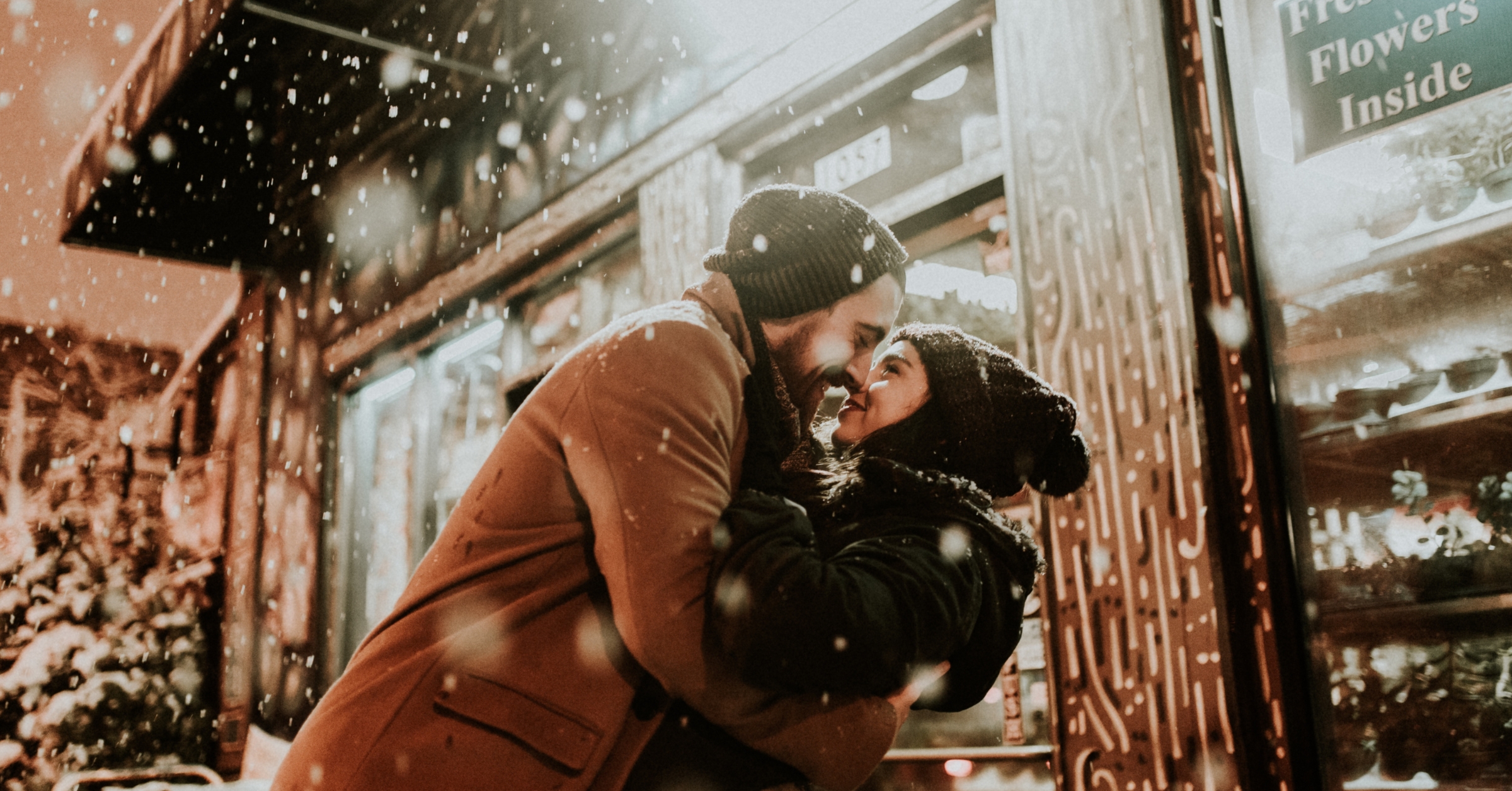 couple madly in love kissing in the snow