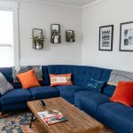 An image of a professionally decorated living room for an article about Airbnb decorating ideas.