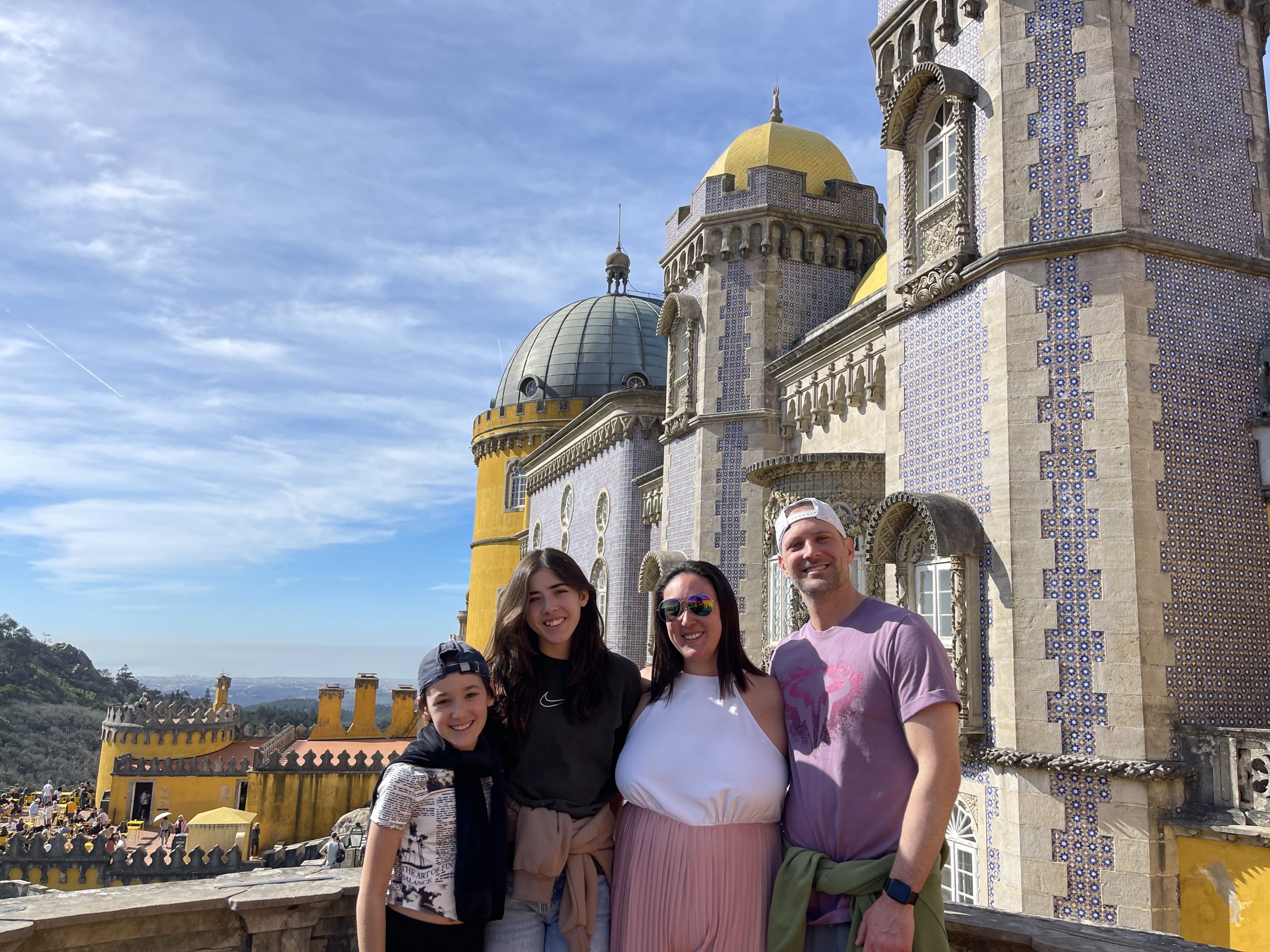 Why are families moving to Portugal?