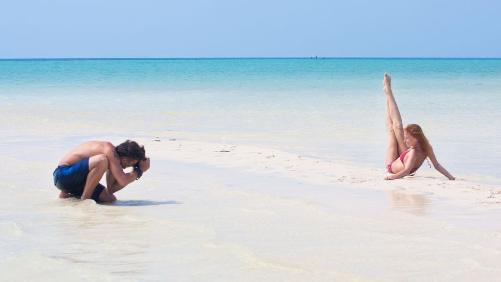 An image of a person doing a photo beachshoot
