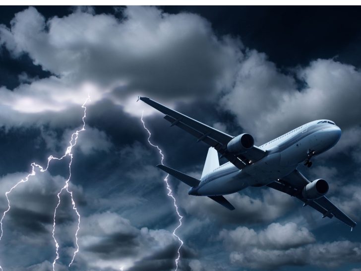 An image of a plane going through dark cloudes for an article about 
