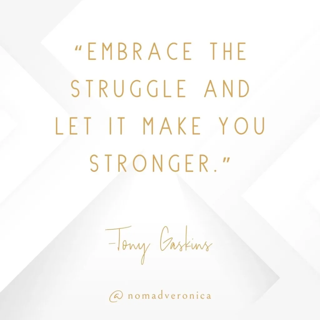 A minimalist white and gold graphic featuring the quote: "Embrace the struggle and let it make you stronger." by Tony Gaskins. The text is styled in elegant typography, with the handle "@nomadveronica" subtly placed at the bottom, adding a modern and motivational touch.