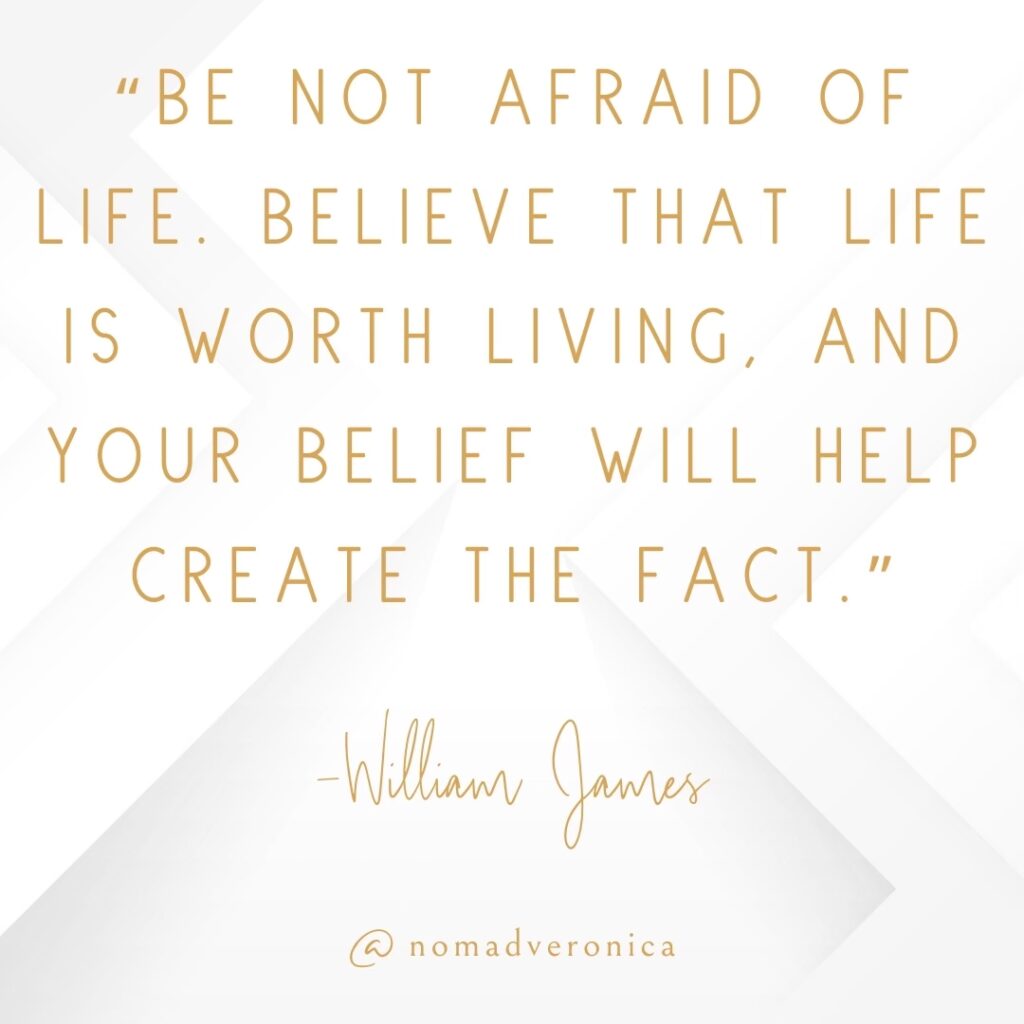 Minimalist white and gold graphic featuring the quote 'Be not afraid of life. Believe that life is worth living, and your belief will help create the fact' by William James, attributed to @nomadveronica. A perfect addition to a section on motivational quotes for embracing new challenges.