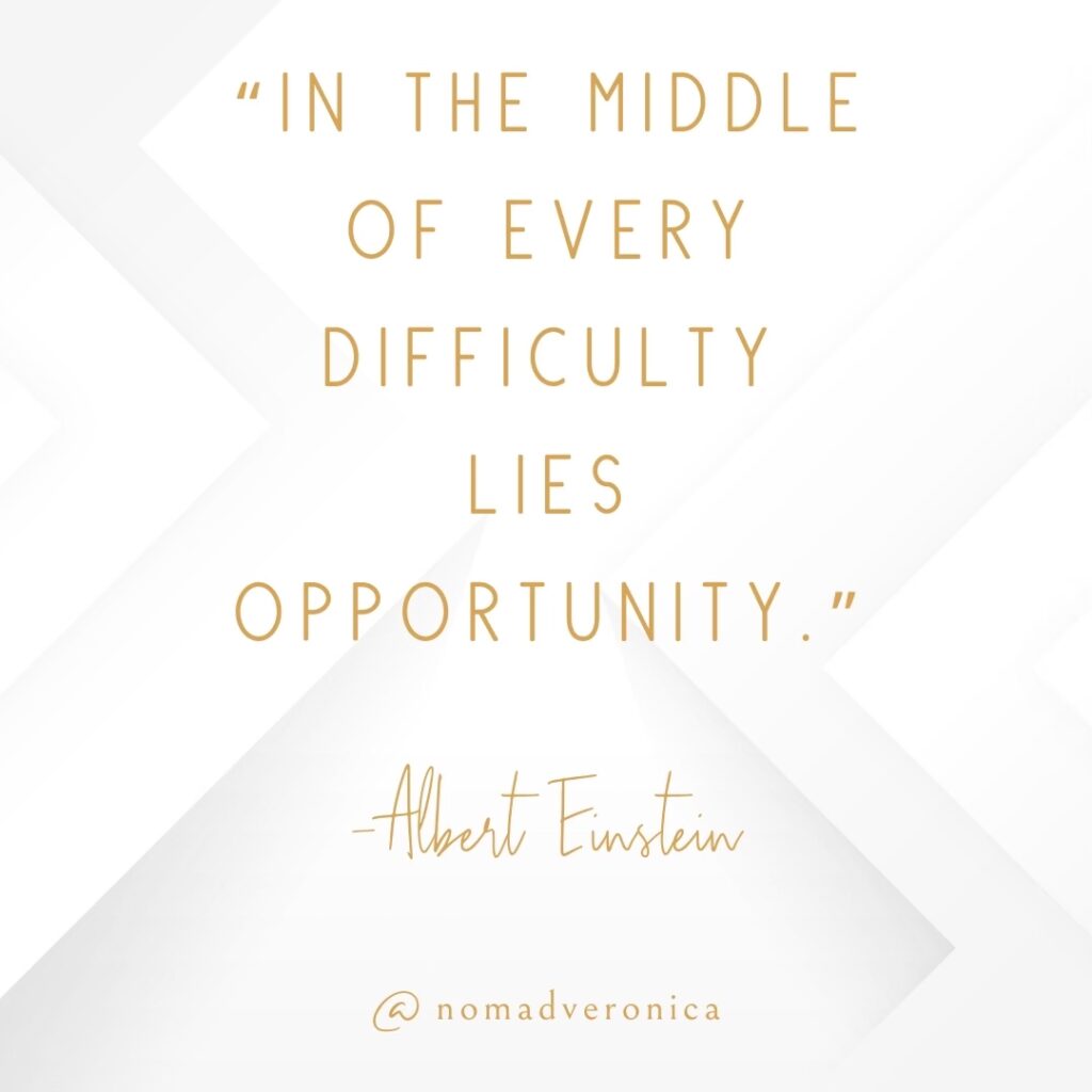 Minimalist graphic with a white and gold design featuring the quote 'In the middle of every difficulty lies opportunity' by Albert Einstein, attributed to @nomadveronica. Ideal for an article section on motivational quotes about overcoming challenges.