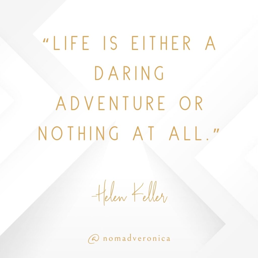 A motivational quote by Helen Keller reads, "Life is either a daring adventure or nothing at all," displayed in elegant gold typography on a white background with subtle geometric patterns. The image includes the handle "@nomadveronica," adding a unique branding touch.