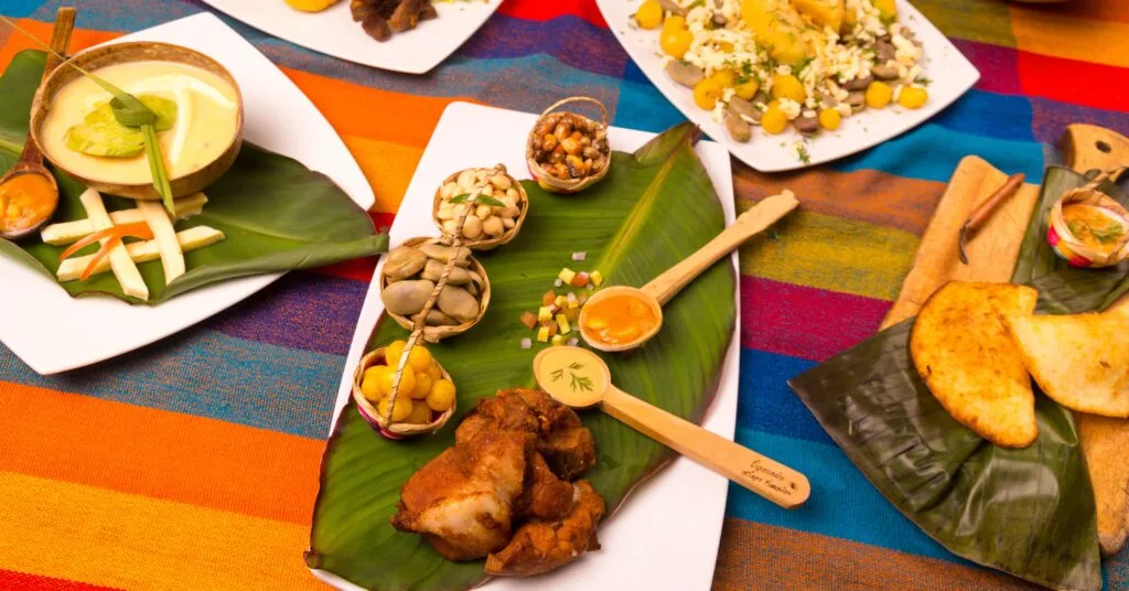 A traditional Ecuadorian meal served on banana leaves, featuring local delicacies like fried pork, cheese, and a variety of sauces. Ecuador expats will love exploring the country’s rich and diverse cuisine.